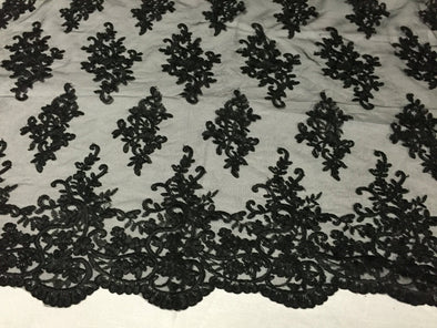 Black classy paisley flowers embroider on a mesh lace -yard