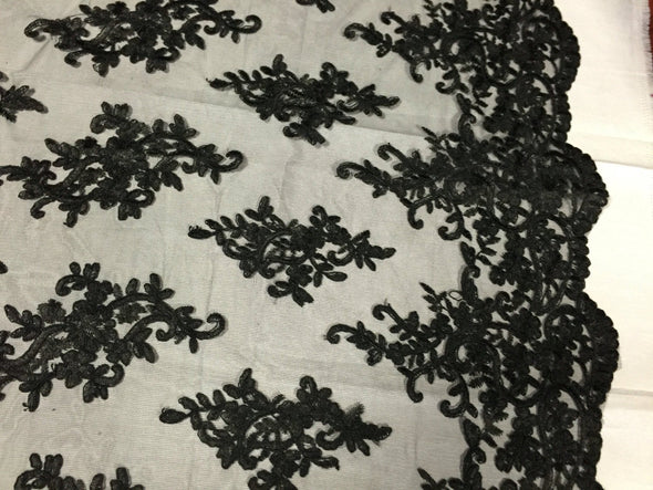 Black classy paisley flowers embroider on a mesh lace -yard