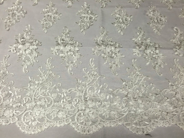 Ivory classy paisley flowers embroider on a mesh lace -yard