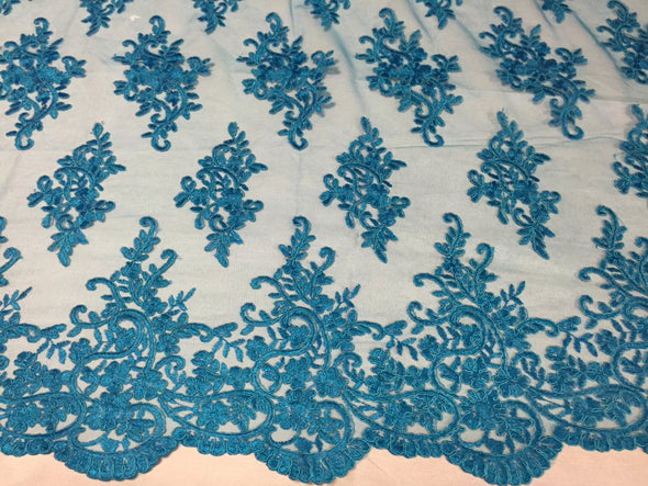 Turquoise classy pailsey flowers embroider on a mesh lace -yard