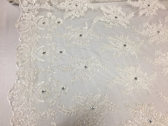 White imperial flower design embroider and beaded on a mesh lace-yd