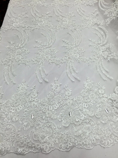 White divine flower design embroider and heavybbeading on a mesh lace-wedding-bridal-prom-nightgown-decorations-sold by the yard.