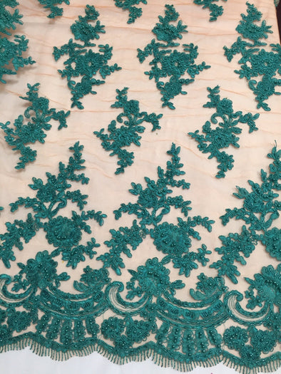 Teal appealing flower deisgn embroider and beaded on an orange mesh lace-prom-nightgown-decorations-dresses-sold by the yard.