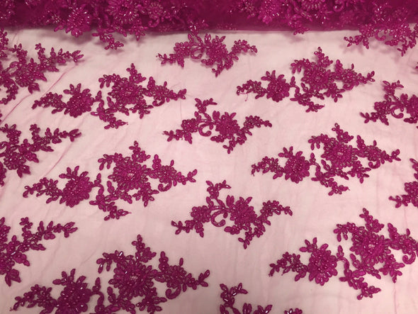 Fuchsia appealing flower deisgn embroider and beaded on a mesh lace-prom-nightgown-decorations-dresses-sold by the yard.