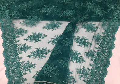 Teal green marvelous design embroider and beaded on a mesh lace-prom-nightgown-decorations-dresses-sold by the yard.
