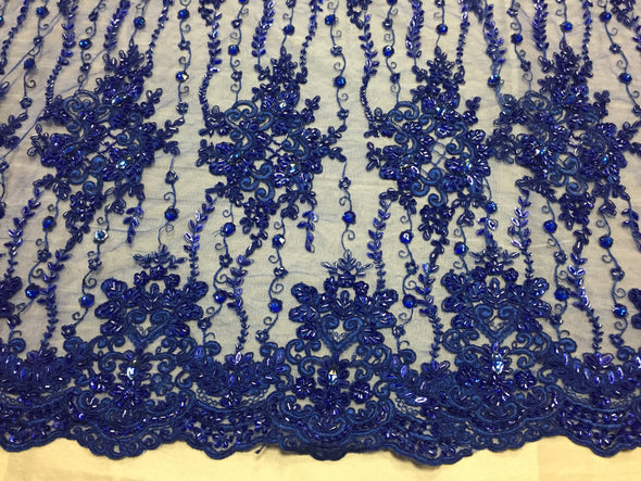 Royal Blue magnificent design embroider and heavy beaded on a mesh lace -yard