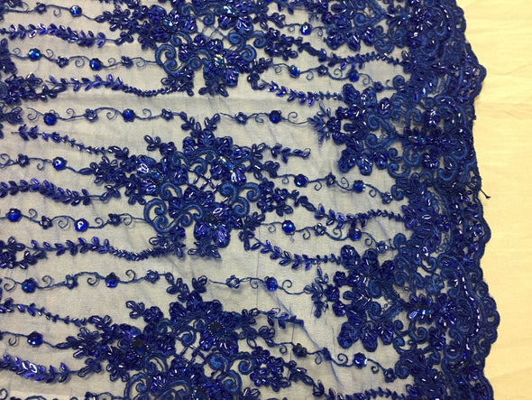 Royal Blue magnificent design embroider and heavy beaded on a mesh lace -yard