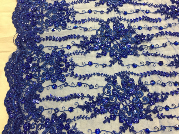 Royal Blue magnificent design embroider and heavy beaded on a mesh lace -yard