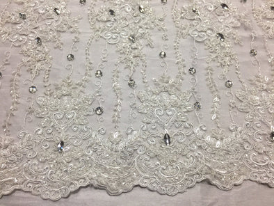 White magnificent design embroider and beaded on a mesh lace -yard