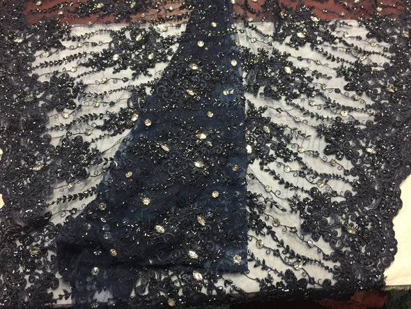 Navy blue maginficent design embroider and heavy beaded on a mesh lace -yard