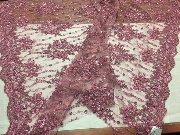 Dusty rose magnificent design embroider and heavy beaded on a mesh lace -yard