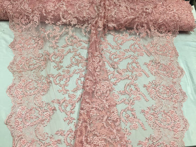 Majestic pink vine design embroider and heavy beaded on a mesh lace-prom-nightgown-decorations-dresses-sold by the yard.