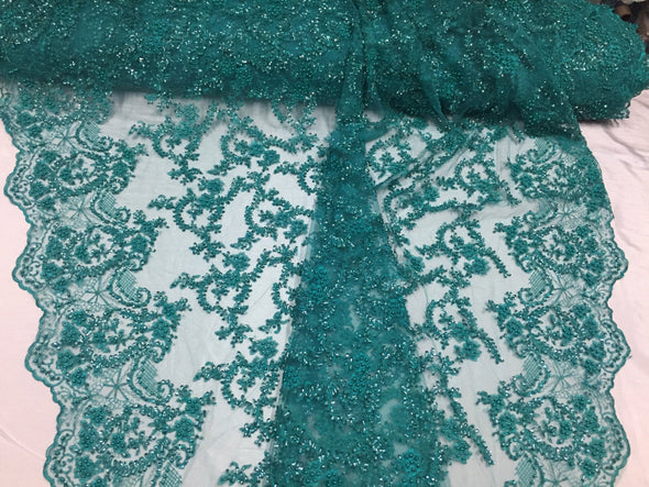 Majestic jade shinny vine design embroider and heavy beaded on a mesh lace-prom-nightgown-decorations-dresses-sold by the yard.