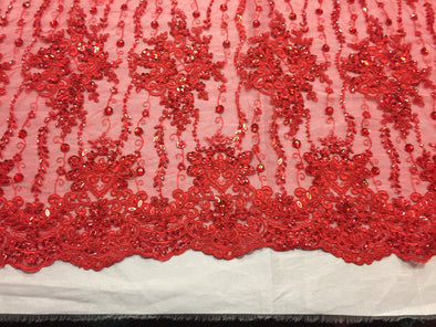 Red Magnificent design embroider and heavy beaded on a mesh lace. Sold by the yard