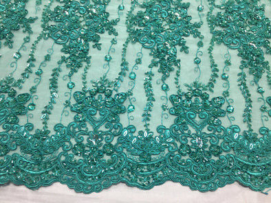 Jade magnificent design embroider and heavy beaded on a mesh lace -yard