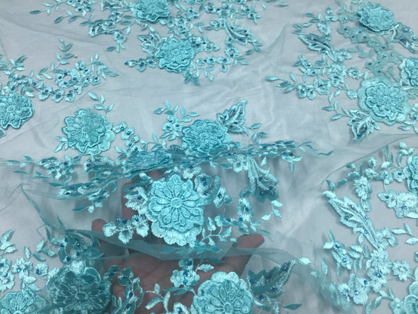 Aqua metallic fanciful 3D fowers ebroider with rhinestones on a mesh lace -yard