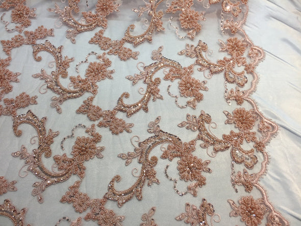 Amazing blush peach pearl design embroider and beaded on a mesh lace-prom-nightgown-decorations -sold by the yard.
