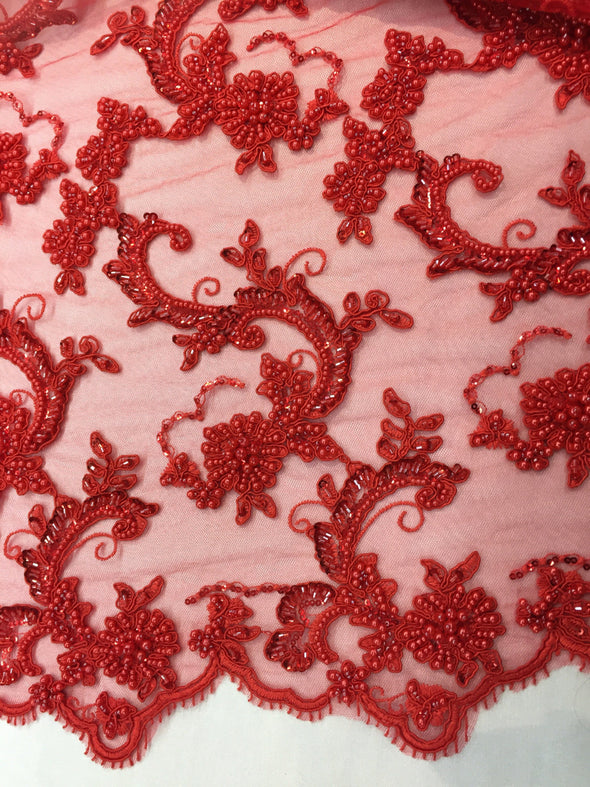 Amazing pearl design embroider and heavy beaded on a mesh lace -yard