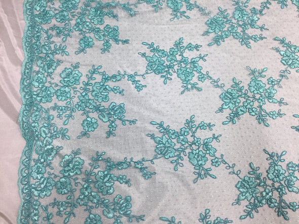 Sensational aqua flowers Embroider And Corded On a mesh lace-prom-nightgown-dresses-decorations-sold by the yard.