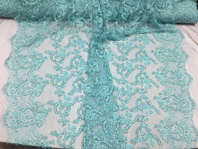 Majestic aqua Vine Design Embroider and heavy beading on a mesh lace-prom-nightgown-decorations-dresses-sold by the yard.