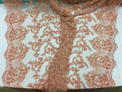 Majestic copper shinny Vine Design Embroider And Heavy Beaded On A mesh lace -Sold by yard