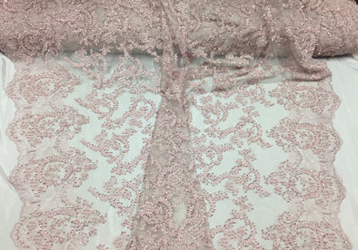 Majestic Light pink shinny vine design embroider and heavy beaded on a mesh lace-prom-nightgown-decorations-dresses-sold by the yard.