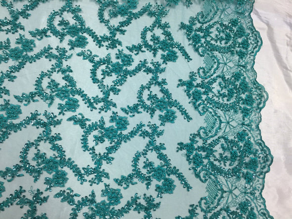 Majestic jade shinny vine design embroider and heavy beaded on a mesh lace-prom-nightgown-decorations-dresses-sold by the yard.