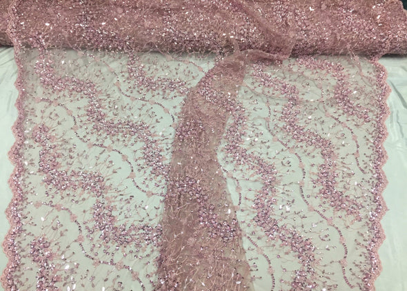Dusty pink french beaded design embroider on a mesh lace-prom-nightgown-bridal-wedding-dresses-fashion-apparel-decorations-sold by the yard.