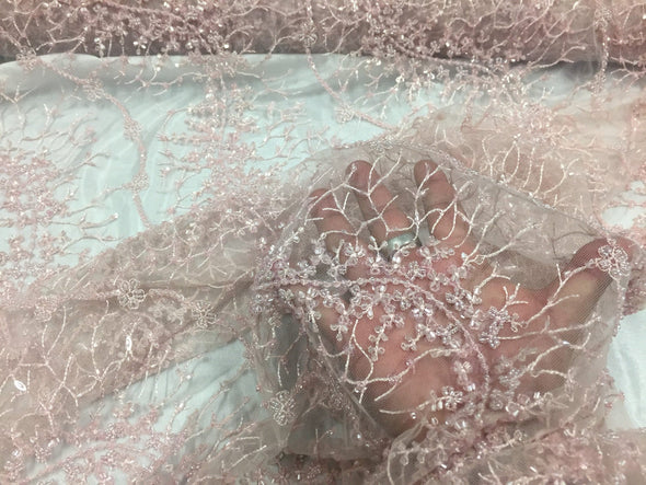 Light pink french beaded design embroider on a mesh lace-prom-nightgown-bridal-wedding-sold by the yard.