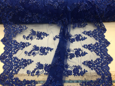 Elegant royal blue hand beaded flower design embroider on a mesh lace-prom-nightgown-bridal-wedding-sold by the yard.
