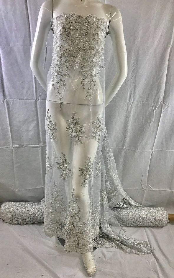 White metallic french flower design embroider and beaded on a mesh-wedding-bridal-prom-nightgown-sold by the yard.