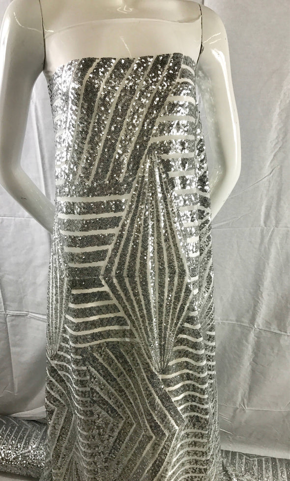Geometric design embroider with silver sequins on a white mesh-fashion-decorations-nightgown-dresses-sold by the yard.