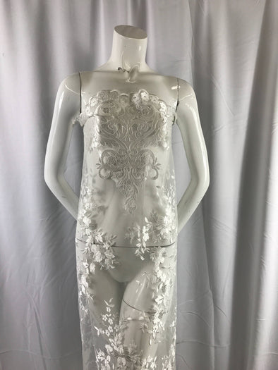 Ivory flowers embroider on a 2 way stretch mesh lace. Wedding/Bridal/Prom/Nightgown fabric-dresses-apparel-fashion-Sold by the yard.