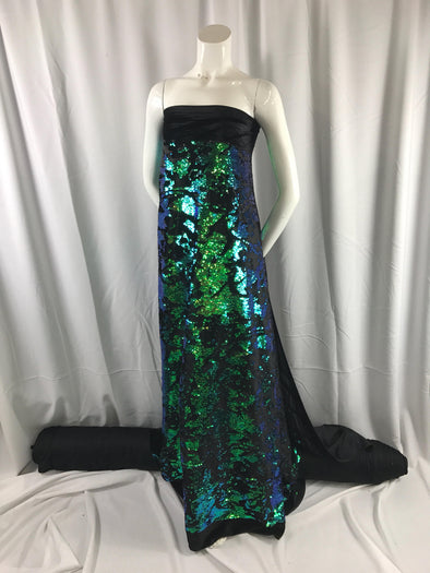 Green iridescent sequins embroider on a black 2 way stretch velvet-apparel-fashion-decorations-dresses-nightgown-sold by the yard.