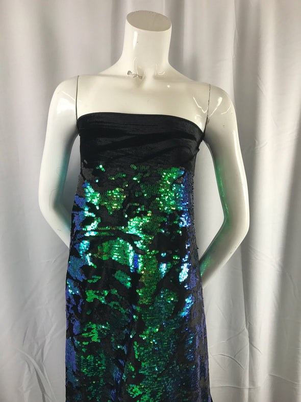 Green iridescent sequins embroider on a black 2 way stretch velvet-apparel-fashion-decorations-dresses-nightgown-sold by the yard.