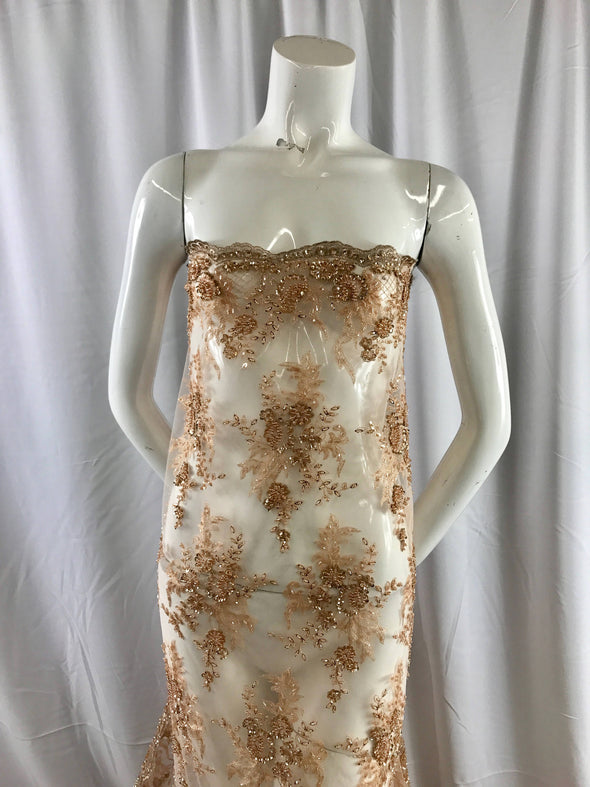 Skin color flowers design embroider and hand beaded on a mesh lace.Wedding/Bridal/Prom/Nightgown fabric-dresses-fashion-apparel-Sold by yard