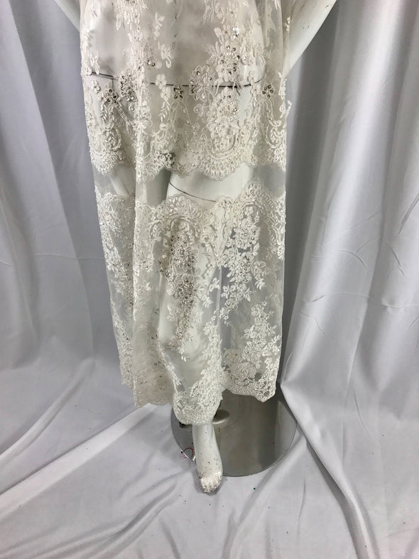 ivory french flower design embroider and hand beaded on a mesh lace-apparel-fashion-decorations-dresses-wedding-bridal-sold by the yard.