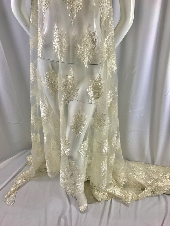 Ivory french design embroider with sequins and hand beaded on a mesh lace-wedding-bridal-prom-nightgown-decorations-sold by the yard.