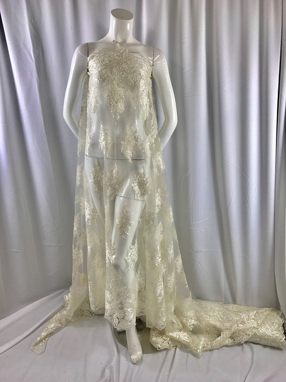Ivory french design embroider with sequins and hand beaded on a mesh lace-wedding-bridal-prom-nightgown-decorations-sold by the yard.