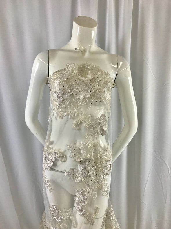 Ivory lavish 3D flowers embroider with sequins and beaded on a mesh lace-prom-nightgown-bridal-wedding-decorations-dresses-sold by the yard.