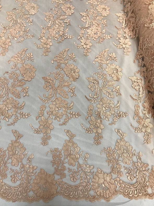 Peach floral design embroider and corded on a mesh lace fabric-prom-nightgown-decorations-fashion-sold by the yard.