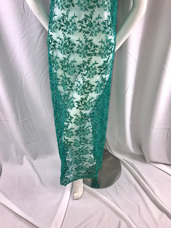 Teal/jade small flowers embroider and hand beaded on a mesh lace fabric-dresses-fashion-dresses-decorations-nightgown-sold by the yard-