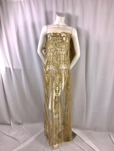 Gold shiny glitter damask design on a mesh lace-prom-decorations-apparel-fashion-nightgown-dresses-sold by the yard.