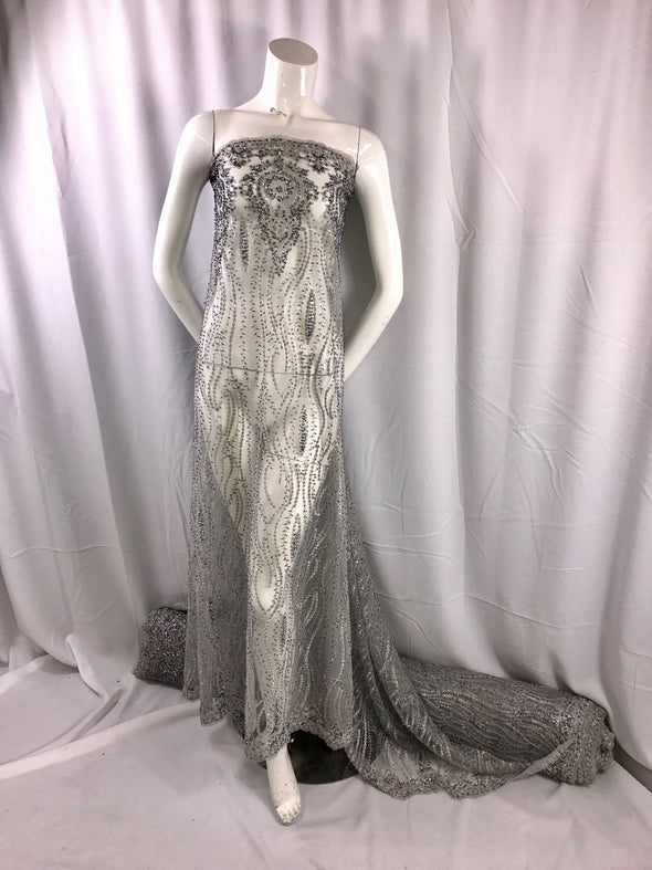 Gray hand beaded fabric lace embroider with metallic tread on a mesh-bridal-prom-nightgown-decorations-sold by the yard.