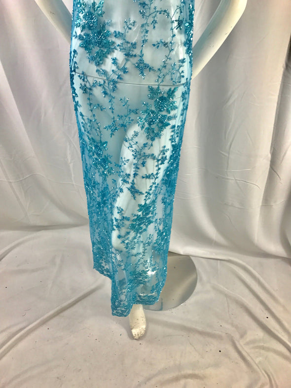 Gorgeous aqua blue flower design embroider and beaded on a mesh lace. Wedding/Bridal/Prom/Nightgown fabric-deresses-Sold by the yard.