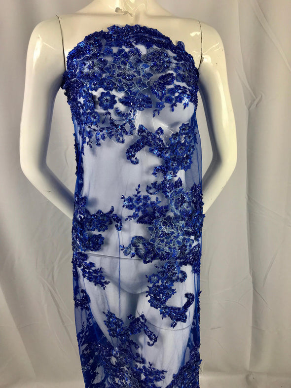 Royal blue multi color 3D floral design embroider with sequins and hand beaded with metallic tread on a mesh lace-dresses-sold by yard.