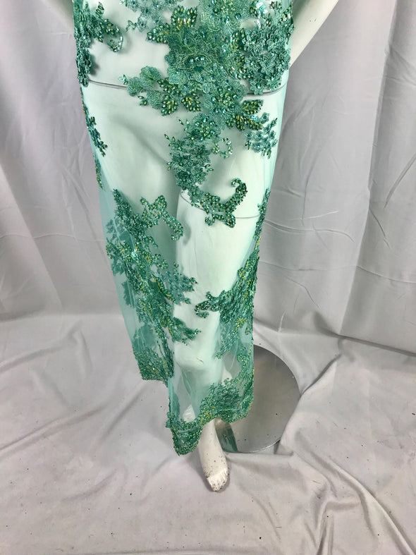 Mint 3D floral design embroider with sequins and hand beaded with metallic tread on a mesh lace-dresses-fashion-prom-sold by yard.