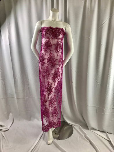 Gorgeous fuchsia/magenta French floral  design embroider and beaded on a mesh lace. Wedding/Bridal/Prom/Nightgown fabric-sold by yard.