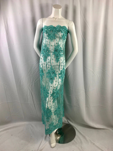 Aqua magnificent design embroider and heavy beaded on a mesh lace-dresses-fashion-apparel-nightgown-prom-sold by yard.