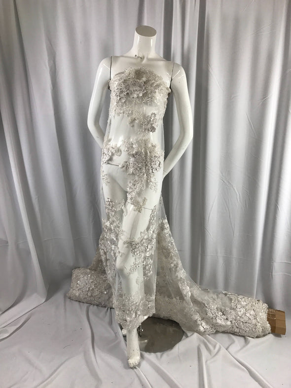 white lavish 3D flowers embroider with sequins and beaded on a mesh lace-prom-nightgown-decorations-wedding-bridal-dresses-sold by the yard.